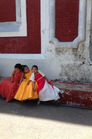 Little kids aving fun after their school presentation. Taken in front of historical Santa Lucia church.の素材