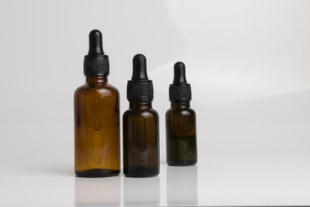 isolated brown glass bottle in brown color for medical and graphical use.の写真素材