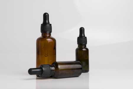 isolated brown glass bottle in brown color for medical and graphical use.の写真素材