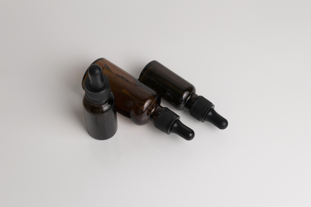 isolated brown glass bottle in brown color for medical and graphical use.の写真素材