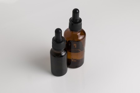 isolated brown glass bottle in brown color for medical and graphical use.の写真素材