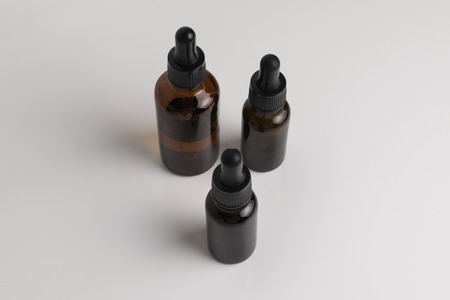 isolated brown glass bottle in brown color for medical and graphical use.の写真素材