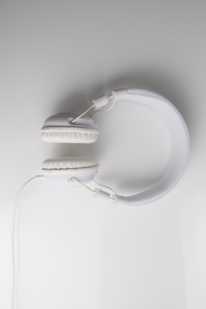 white headphone device isolated on a white background for music companies.の写真素材