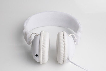 white headphone device isolated on a white background for music companies.の写真素材