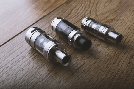 vaping devices or electronic cigarette on a wooden backgroundの写真素材