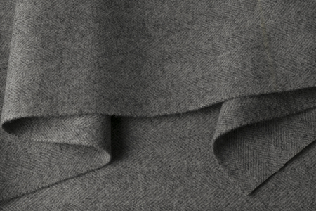 Gray wool fabric, textile with patterns backgroundの写真素材