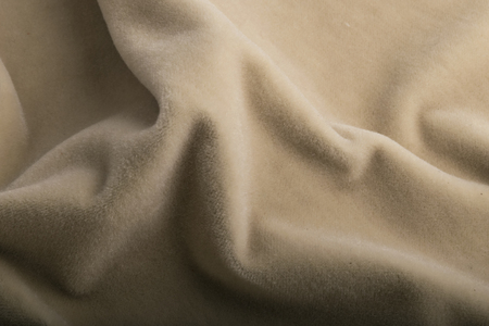 Velour beige fabric textile background. with velvet effect.の写真素材