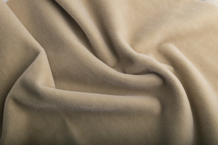 Velour beige fabric textile background. with velvet effect.の写真素材