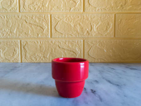 Red cute ceramic tiny potの写真素材