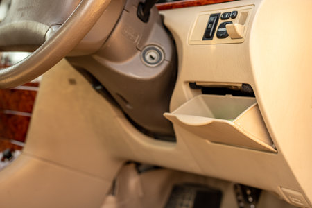 Small storage compartment below steering wheelの写真素材