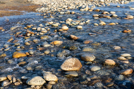 River shallow water stream closeupの写真素材