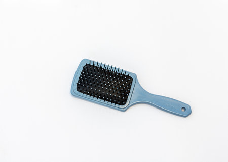 Hair Brush on white background flat lay high angle viewの写真素材