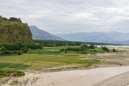 Panoramic view of river swat flooding agriculture fields high angle viewの写真素材