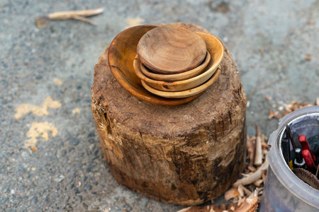 Making wooden bowl with hands in a workshopの写真素材