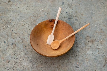 wooden bowl with wooden spoons. Top viewの写真素材