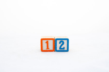 Wooden block one and two number on white background with copy spaceの写真素材