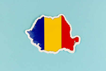 Romania Map with Flag Colors on Light Blue Backgroundの写真素材