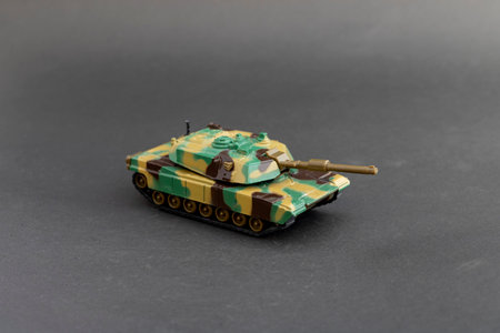 Camouflage tank model on black backgroundの写真素材