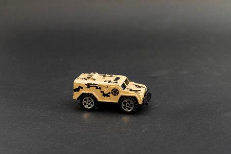 Side view of tan military vehicle model with star insigniaの写真素材