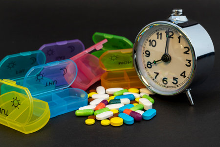 Weekly pill boxes help arrange and plan the time and day of pill consumption. Medical and healthcare conceptsの写真素材