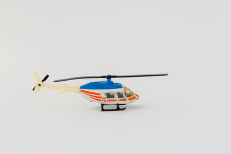 Miniature Used Toy Helicopter on White Background.の写真素材