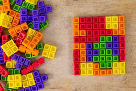 Playing Block Game on a Wooden Tableの写真素材