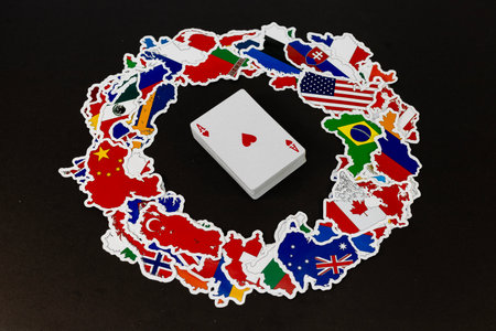 Ace of Hearts Playing Card Surrounded by World Map Flagsの写真素材