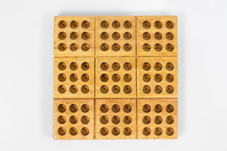 Wooden Sudoku Puzzle Game Board with Grid and Peg Holesの写真素材