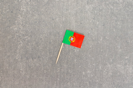 Single Portuguese Toothpick Flag on Gray Backgroundの写真素材