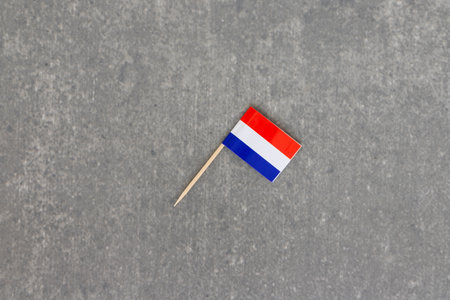 Angled Dutch Flag on Gray Backgroundの写真素材