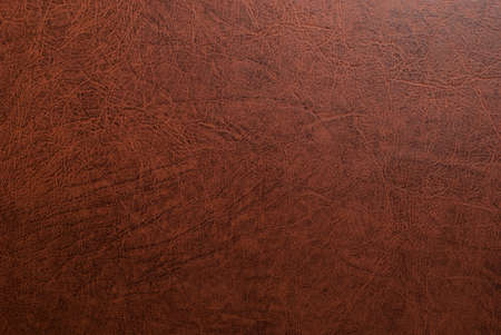 Background texture of a brown grainy leather