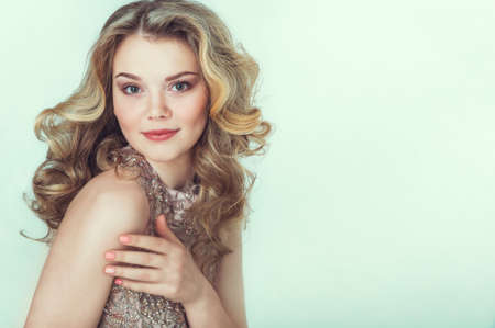 Beautiful bride in wedding dress. Portrait of young bride. Studio shot.の写真素材