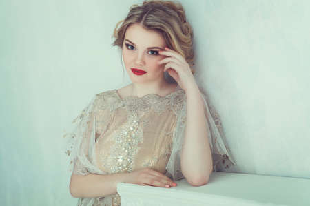 Beautiful bride in wedding dress. Portrait of young bride. Studio shot.の写真素材