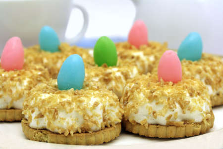 marshmallow coconut cakes decorated with small Easter eggs