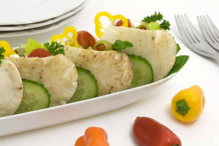 Healthy and colorful pita pockets filled with vegetableの写真素材