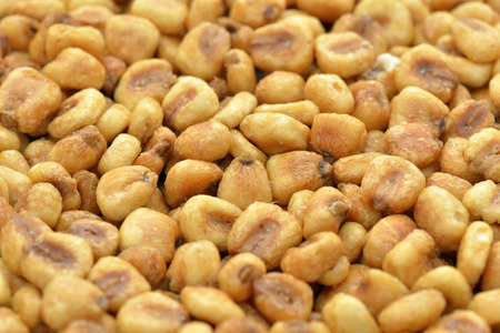 Close-up of roasted corn nuts to use as backgroundの写真素材