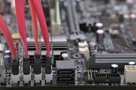 Close-up of motherboard socket and  hardware connectionの写真素材
