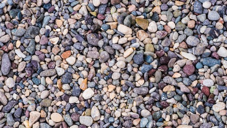 Colorful tiny pebbles used for decorationの写真素材