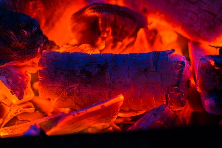 Burning coals closeup red ash