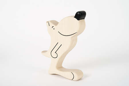 Handmade felt toys animals over wooden rustic background. Felt toys story fairy tale. On the white background with shadow reflectionの写真素材