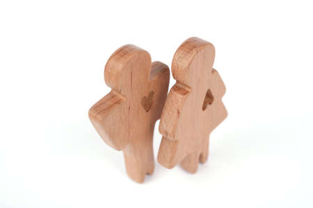 Silhouettes of man, woman and heart cut out inside the figures on a white background. Happy couple in love. Different love waysの写真素材