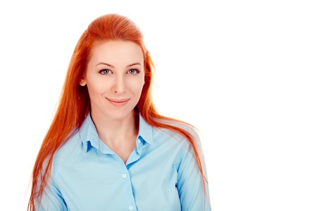 Closeup portrait of a beautiful happy woman in her 30s looking at camera smiling cheerful wearing...
