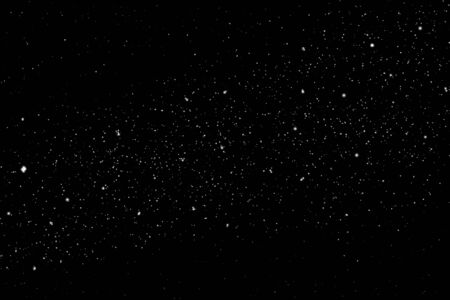 Freeze motion of white powder star dust  isolated on black, dark background. Abstract design of...