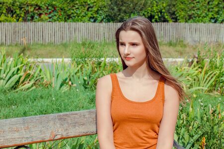 Sensual portrait of a woman, beautiful face female enjoying nature in the village, thinking dreamy...