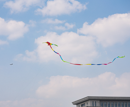 Kite flying in the clear blue skyのeditorial素材