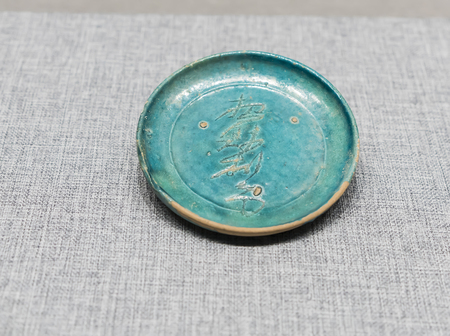Yuan Dynasty peacock blue glazed pottery plate at hebei museumのeditorial素材
