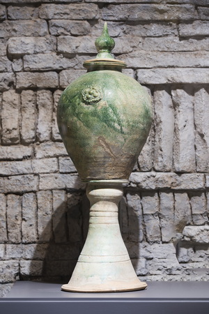 Tower-shaped glazed pottery from Tang Dynasty in Weizhou Museum at Hebei Province, Zhangjiakou City, Yu County, China.のeditorial素材