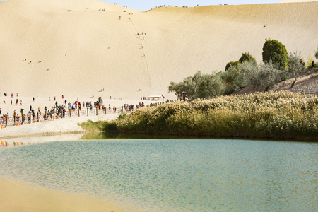 China, Gansu Province, Jiuquan City, Dunhuang City, Mingsha Mountain Crescent Springのeditorial素材