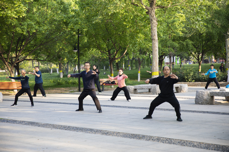 Citizens practicing Tai Chi in the park, Shijiazhuang City, Hebei Province, Chinaのeditorial素材