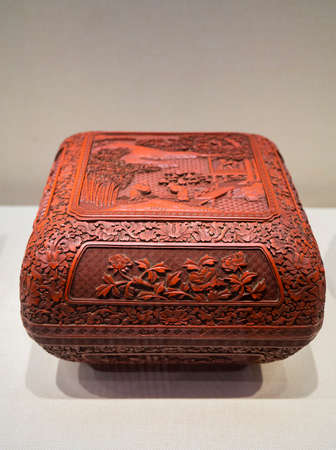 China, Henan Province, Kaifeng City, Kaifeng Museum, collection of cultural relics, Qing Dynasty, red carving lacquer, landscape figures, flowers, square corner boxのeditorial素材